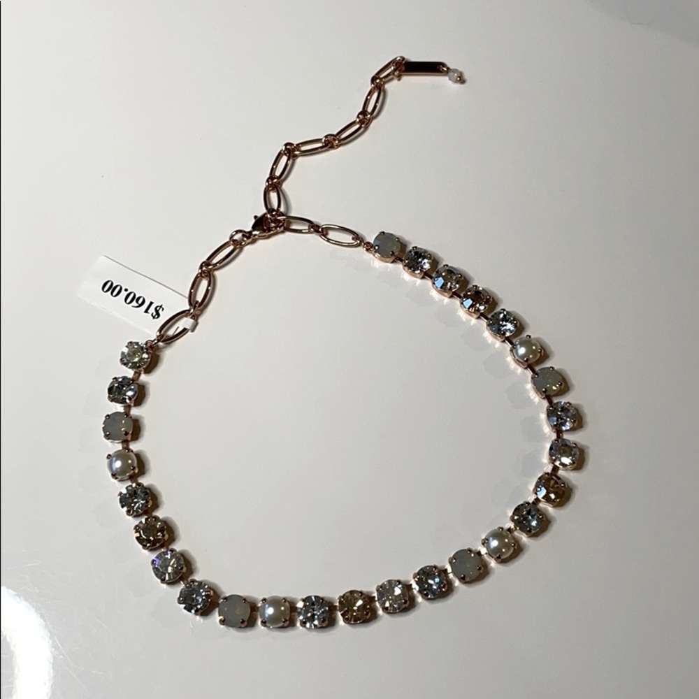 Golden choker with pearls